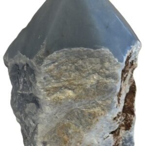 Natural rough angelite freeform with polished point 3 sians emporium Natural rough angelite freeform crystal with unpolished sides and a smooth polished blue point standing on a white background